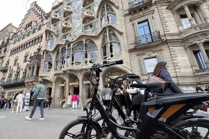 3 Hours Barcelona Guided Gaudi E-Bike Tour - Port Olímpic closes the loop at the coast