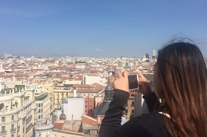 Architecture tour Gran Vía from its best rooftops 20thC - The Carrion Building and the Schweppes sign
