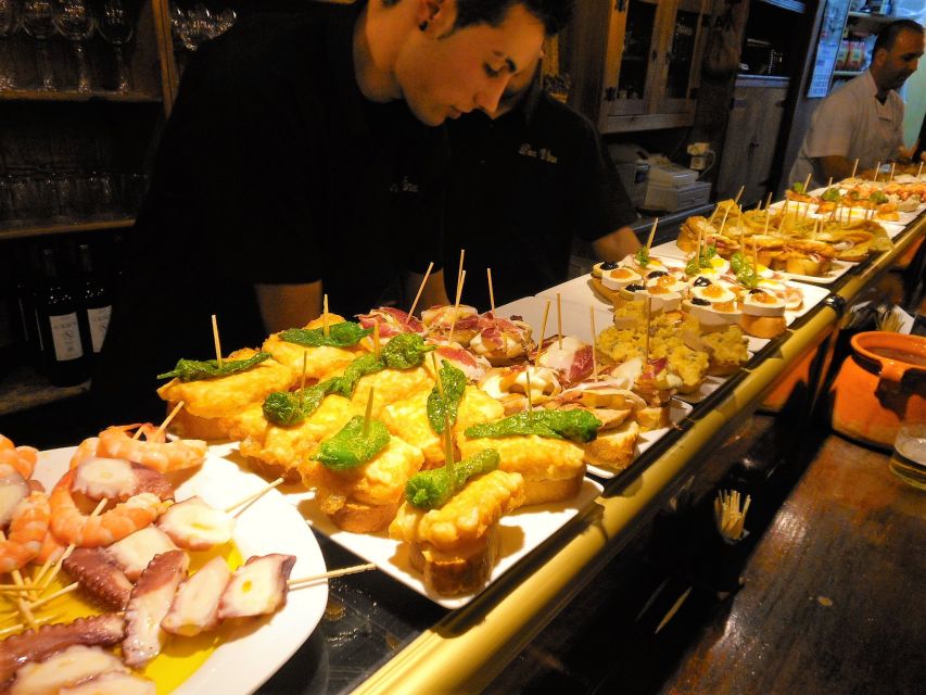 Barcelona: Evening Walking Tour in the Gaudi Area with Tapas - Four stops that turn dinner into a Barcelona evening