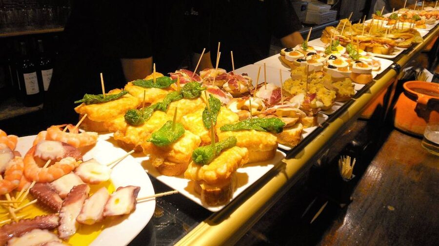 Barcelona: Evening Walking Tour in the Gaudi Area with Tapas - A final stop that brings Spain together