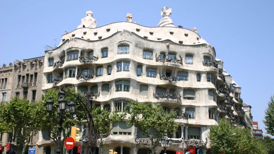 Barcelona: Evening Walking Tour in the Gaudi Area with Tapas - Walking Passeig de Gracia after dark
