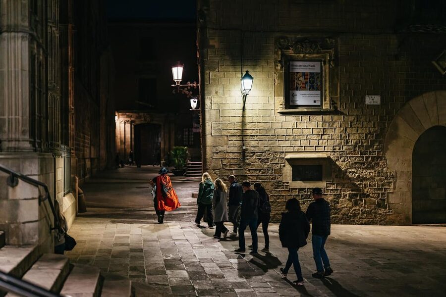 Barcelona: Gothic Quarter Ghosts and Legends Walking Tour - Entering the Gothic Quarter after sunset