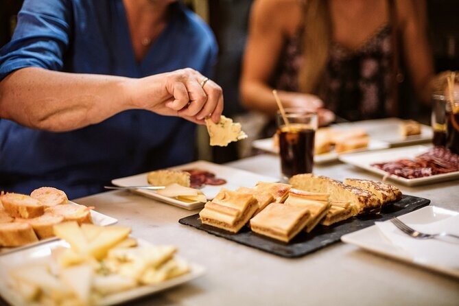 Barcelona Gothic Quarter Tapas & Taverns Food & Wine Tour - Roman stones and medieval lanes between bites