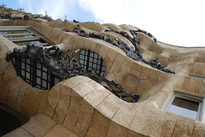 Barcelona Private Walking Tour with Skip the Line La Pedrera and Casa Batllo - Walking Passeig de Gràcia between the houses