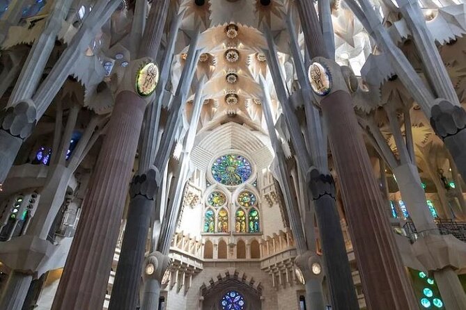 Barcelona: Sagrada Familia Skip The Line Insider Guided Tour - Inside the basilica: columns, light, and a very high ceiling