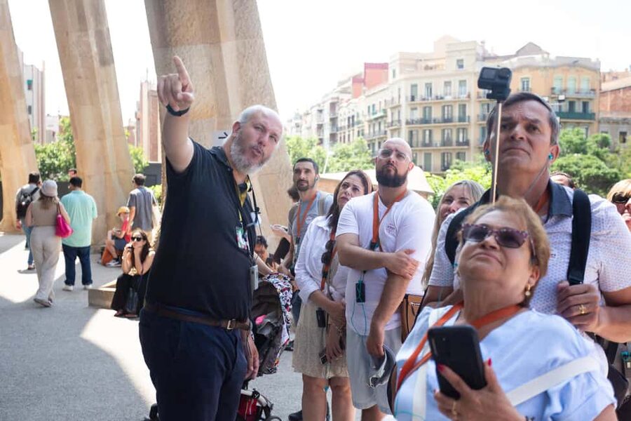 Barcelona: Sagrada Familia Skip-the-line Tour with Guide - Inside the basilica: columns, ceilings, and colored light