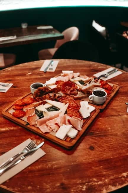 Barcelona: Tipsy Tapas & History Tour in the Gothic Quarter - Second stop: bold flavors in a lively old bar