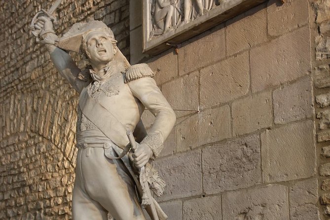 Dijon Signature Walk: Gothic Landmarks & Ducal Grandeur - Notre-Dame, the owl, and Gothic details