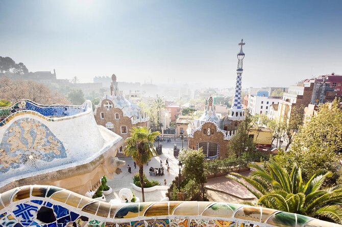 Explore Gaudi's Masterpiece on a Guided Tour of Parque Guell - El Drac and the Colorful Entrance Areas