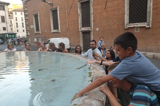 Guided Walking Tour of Rome: Top Sights & Baroque Treasures - Trevi Fountain: a photo stop with a famous ritual