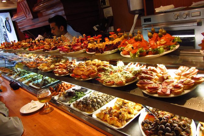 Night Tapas Walking Tour in Barcelona Modernist Area with Small Group and Dinner - Four stops, four different ways to eat in Barcelona