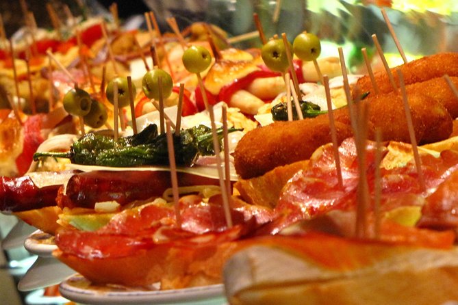 Private Tapas Walking Tour in Barcelona Modernist Area with Dinner included - Walking through Barcelona’s Modernist district