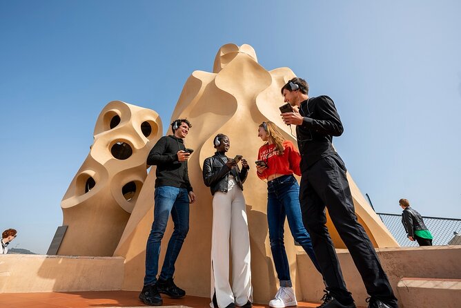 Sagrada Familia & La Pedrera Small Group Tour with Cava Tasting - Sagrada Familia: a powerful finish beneath colored light