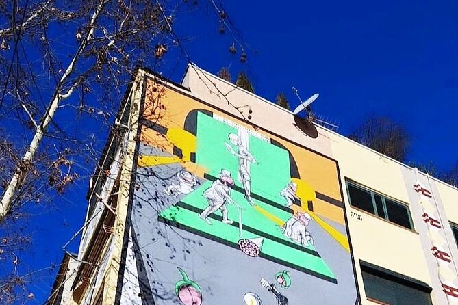 Tirana: Street Art & Modern Architecture Tour - Finding art in ordinary street details