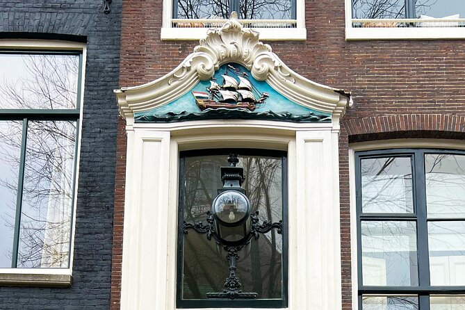 Walking Tour about Golden Age Architecture, private local guide - Jordaan and the stories hidden in facade stones